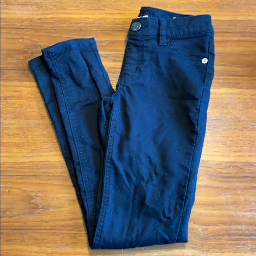 Justice black mid rise jegging in size 12